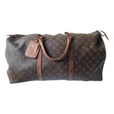 LOUIS VUITTON - FRANÇA. Bolsa de viagem no padrão