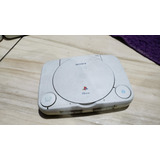 Playstation 1 Psone Só O Aparelho Sem Nada E O Leitor Não Leu Os Jogos E A Tampa Ta Solta. Tá Com Defeito. 344. A100