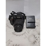 Máquina Nikon D5100 Lente