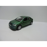 Miniatura Opel Astra Hatch 4 Portas Welly N 9749 Sunshine