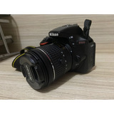 Nikon D5600 Com Lente 18 55 Mm Carregador Bateria Bolsa