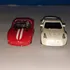 Pacote Com 2 Miniaturas Maisto Variadas Dodge E Nissan B928
