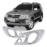 Par Aplique Moldura Farol Principal Hillux Sw4 2005 A 2008